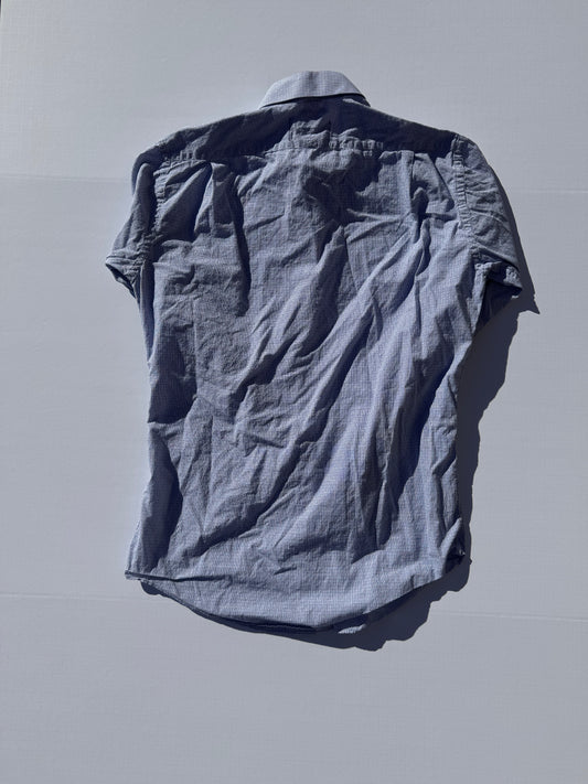 CHECKED: Upcycled 'issho United' logo shirts