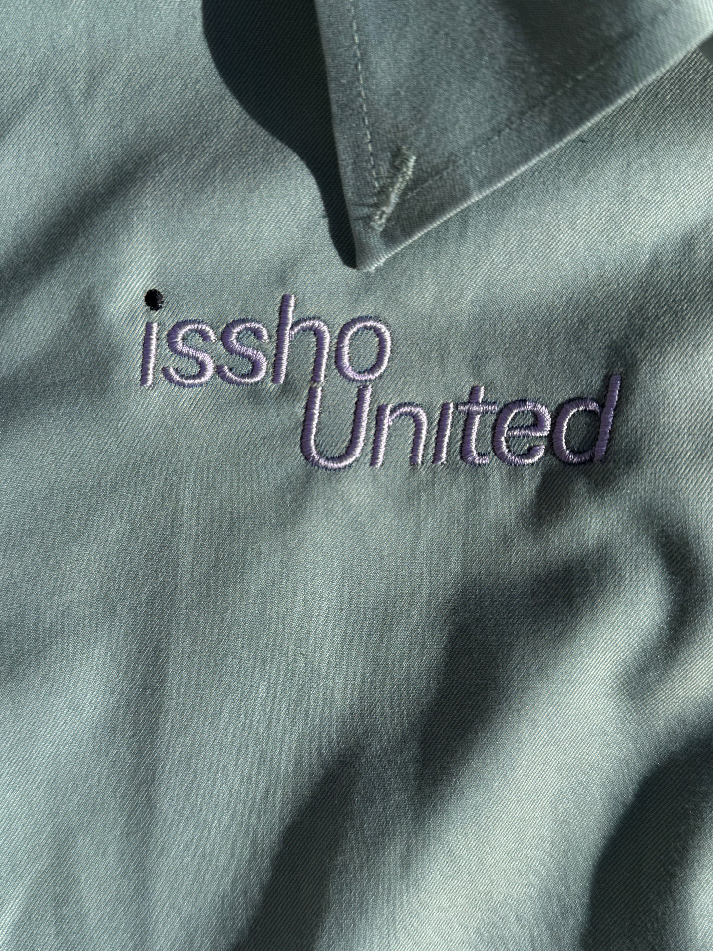 CLASSICGREEN: Upcycled 'issho United' logo shirts