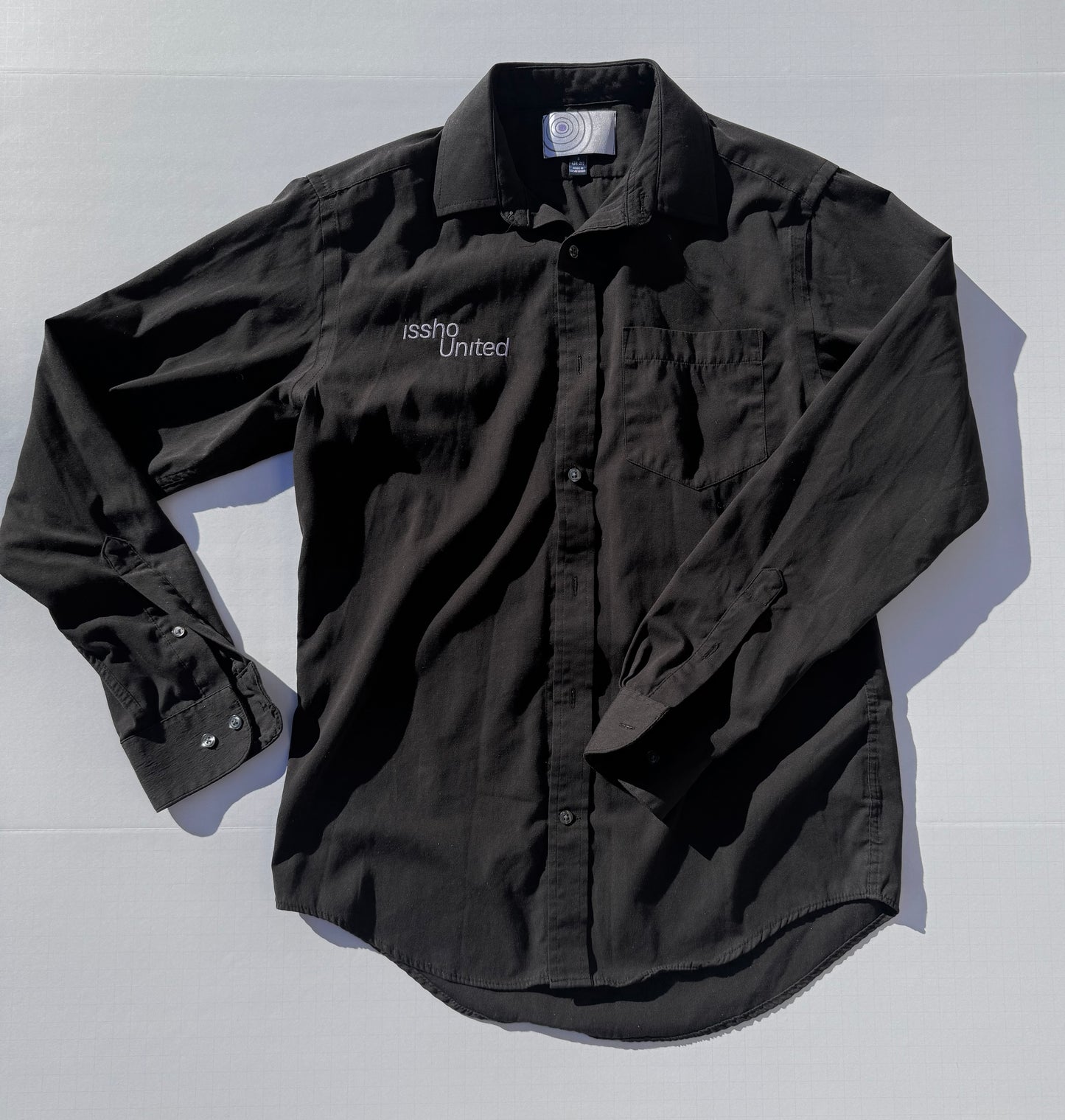 BLK: Upcycled 'issho United' logo shirts