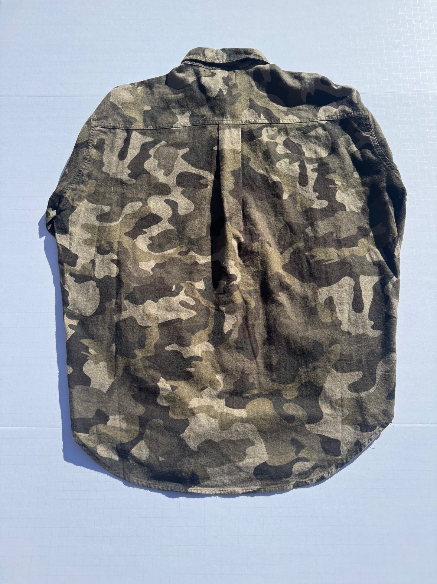 CAMO: Upcycled 'issho United' logo shirts