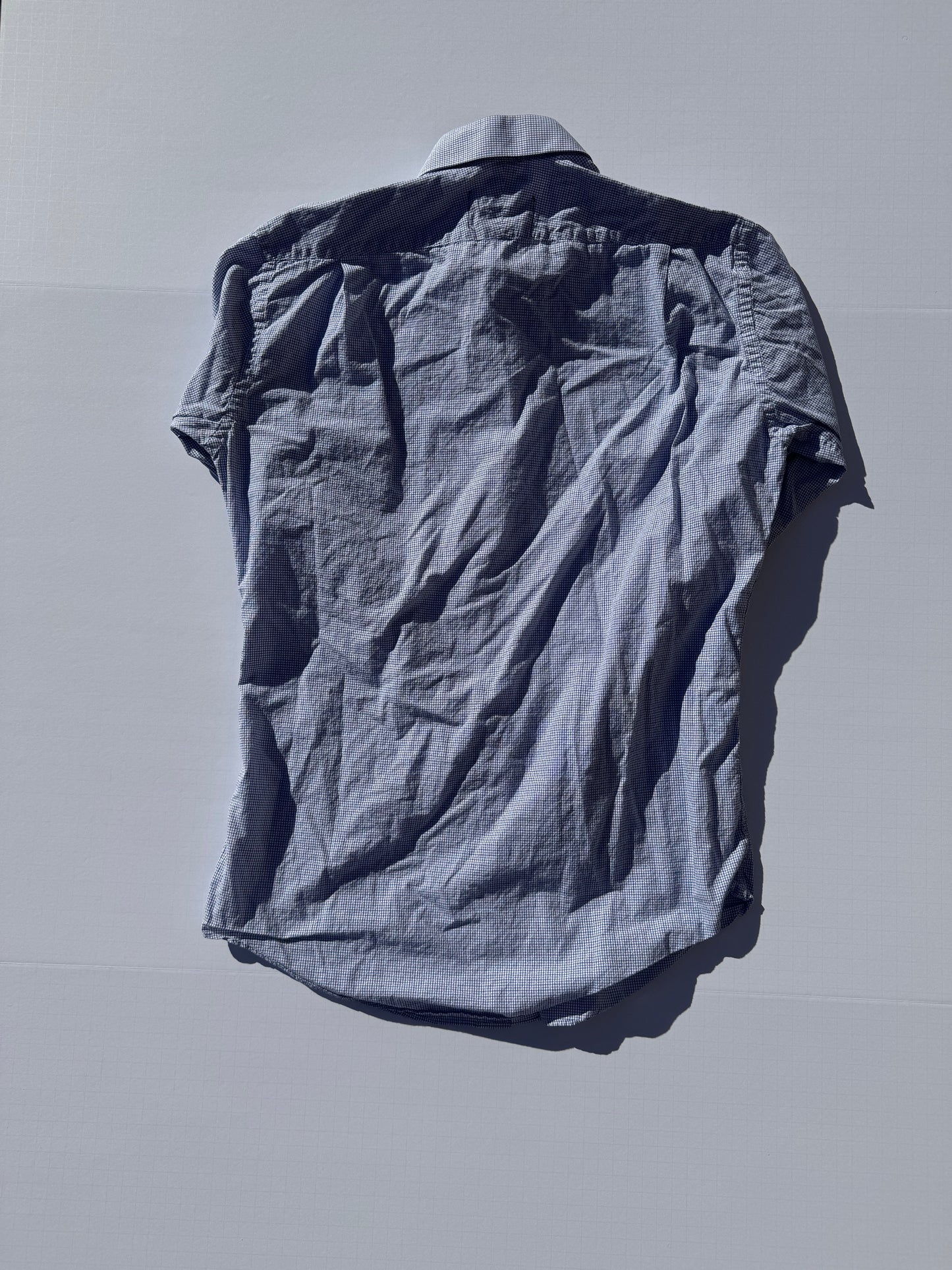 CHECKED: Upcycled 'issho United' logo shirts