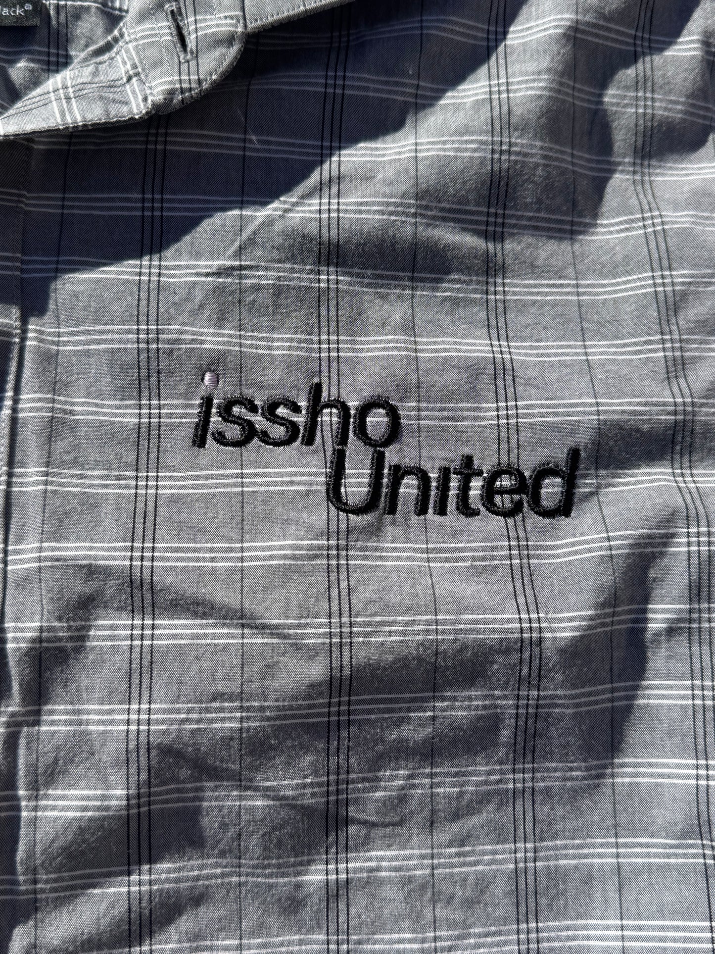 CHESS: Upcycled 'issho United' logo shirts