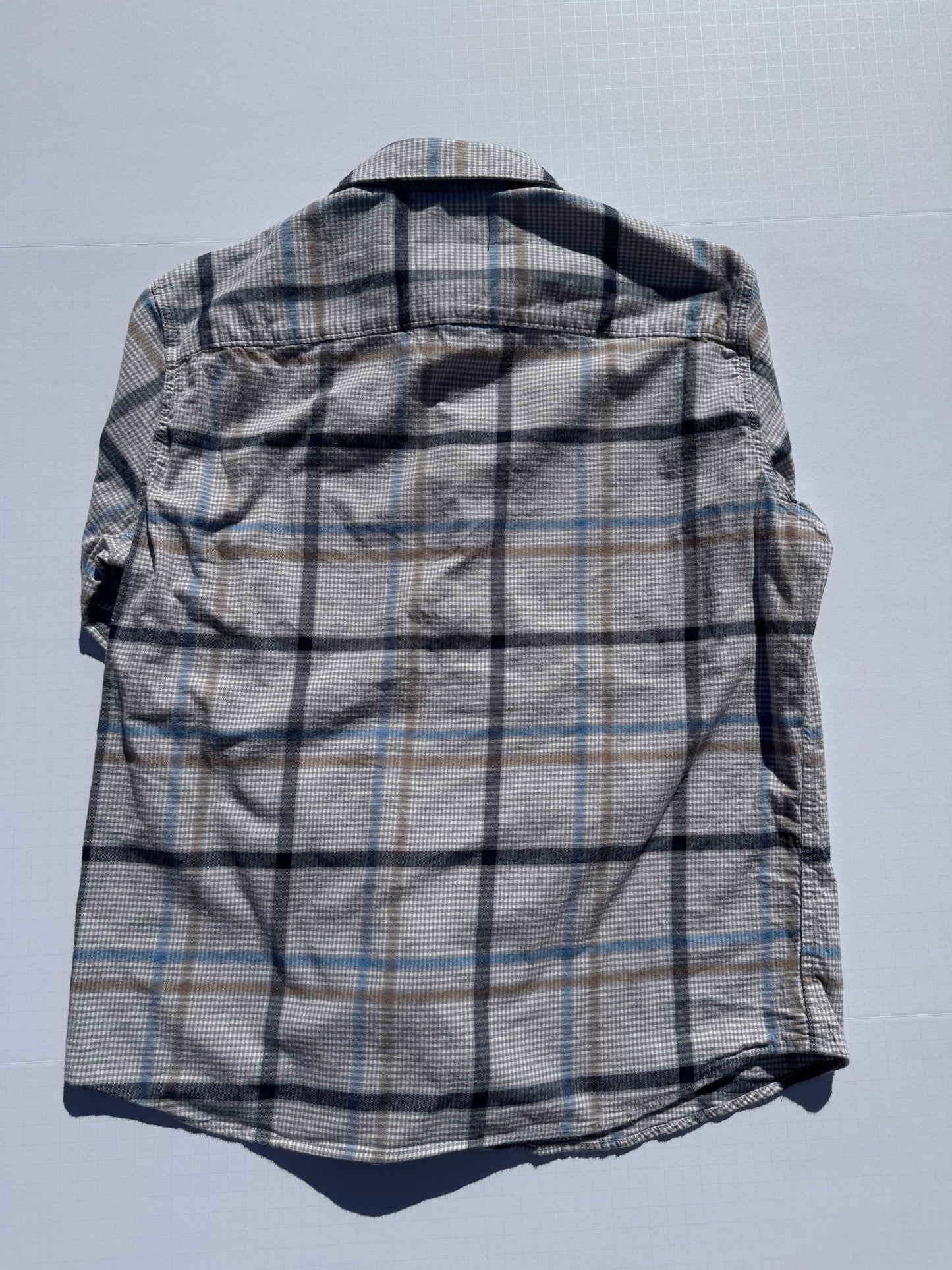 FLANNEL: Upcycled 'issho United' logo shirts