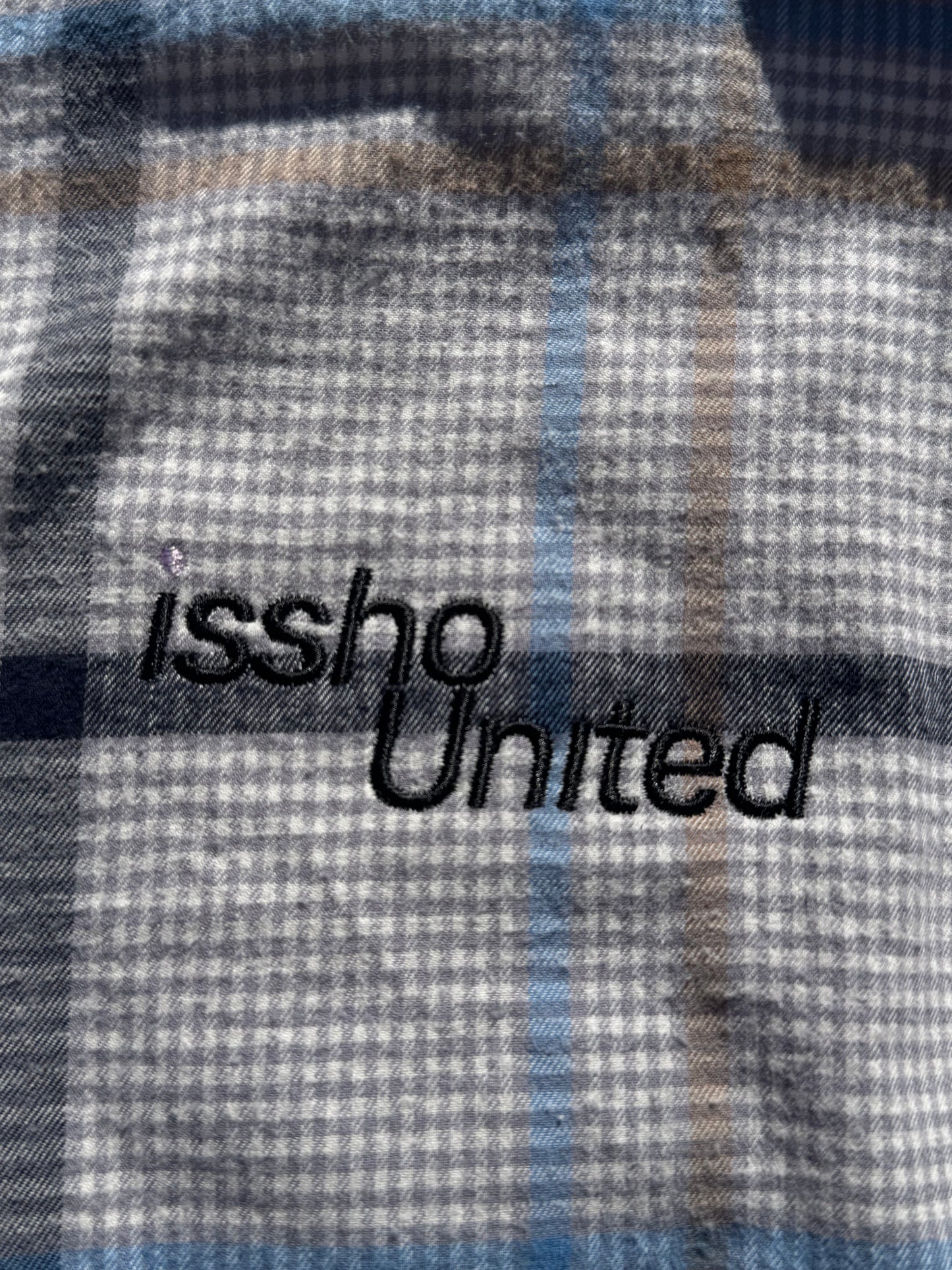 FLANNEL: Upcycled 'issho United' logo shirts