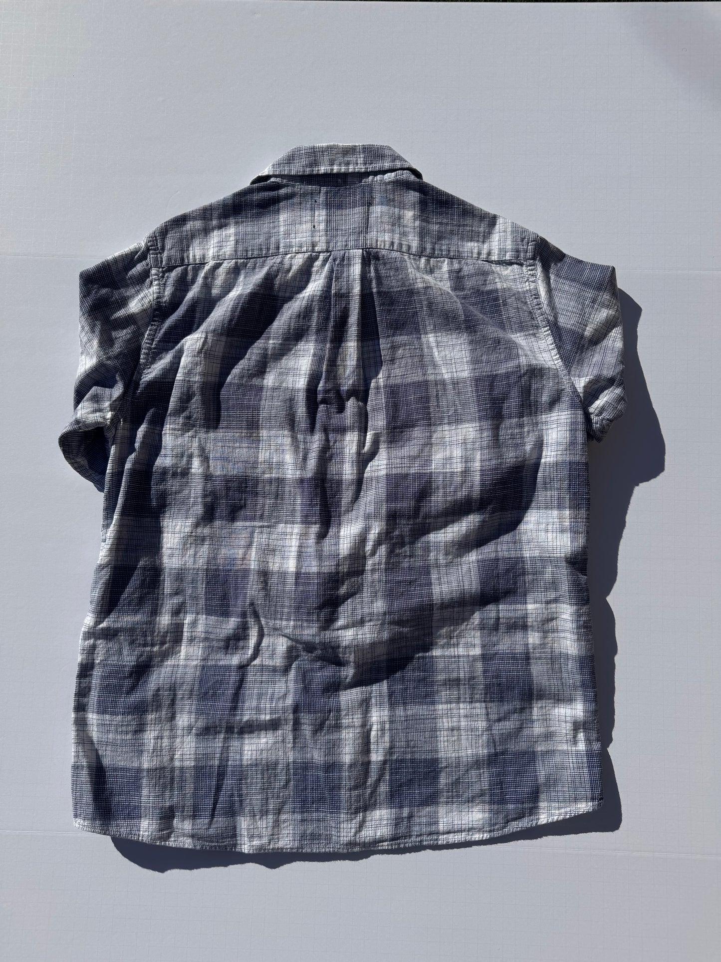 NAVY: Upcycled 'issho United' logo shirts