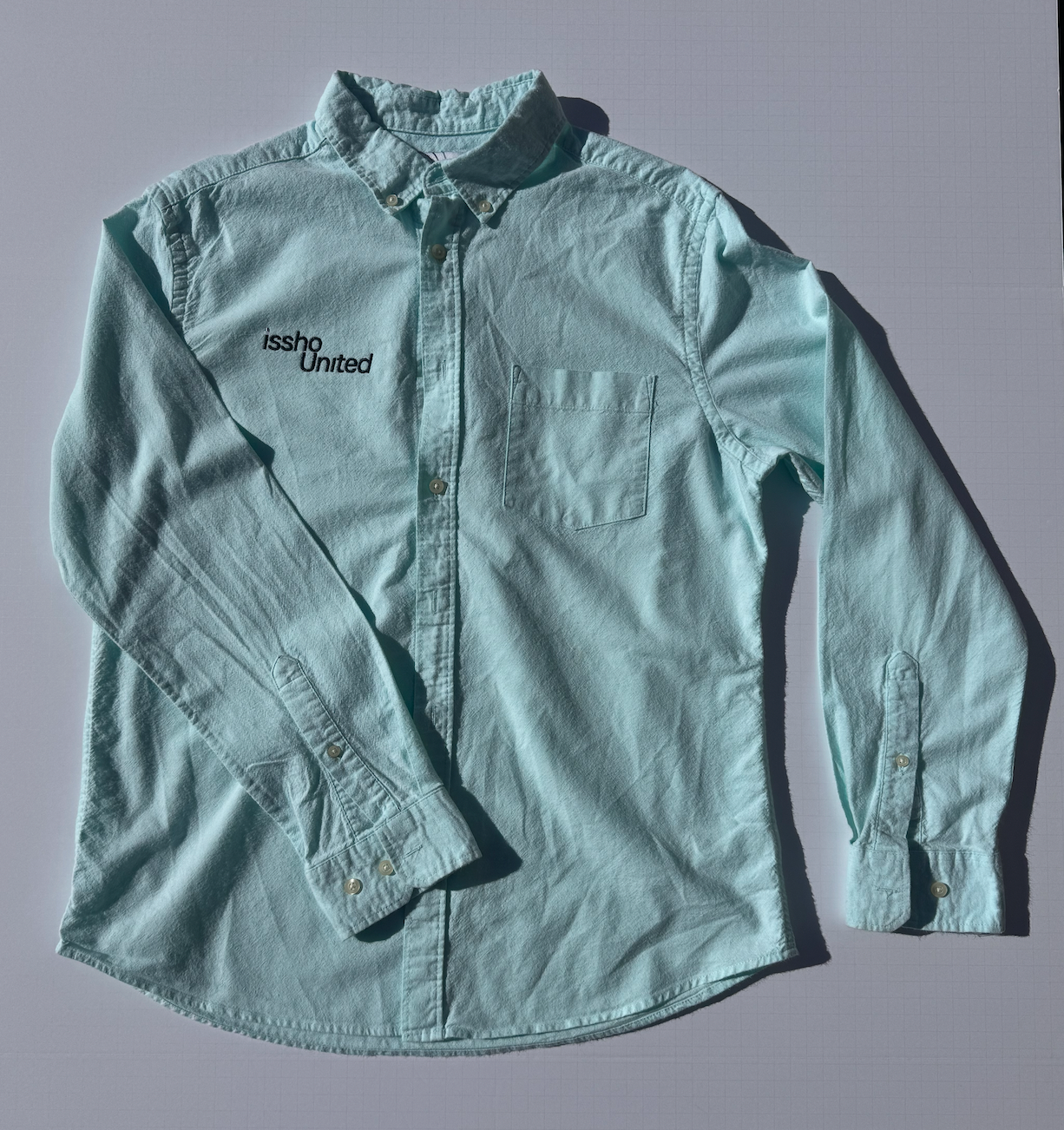 MINT: Upcycled 'issho United' logo shirts