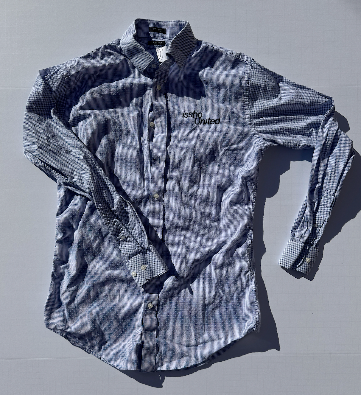 CHECKED: Upcycled 'issho United' logo shirts