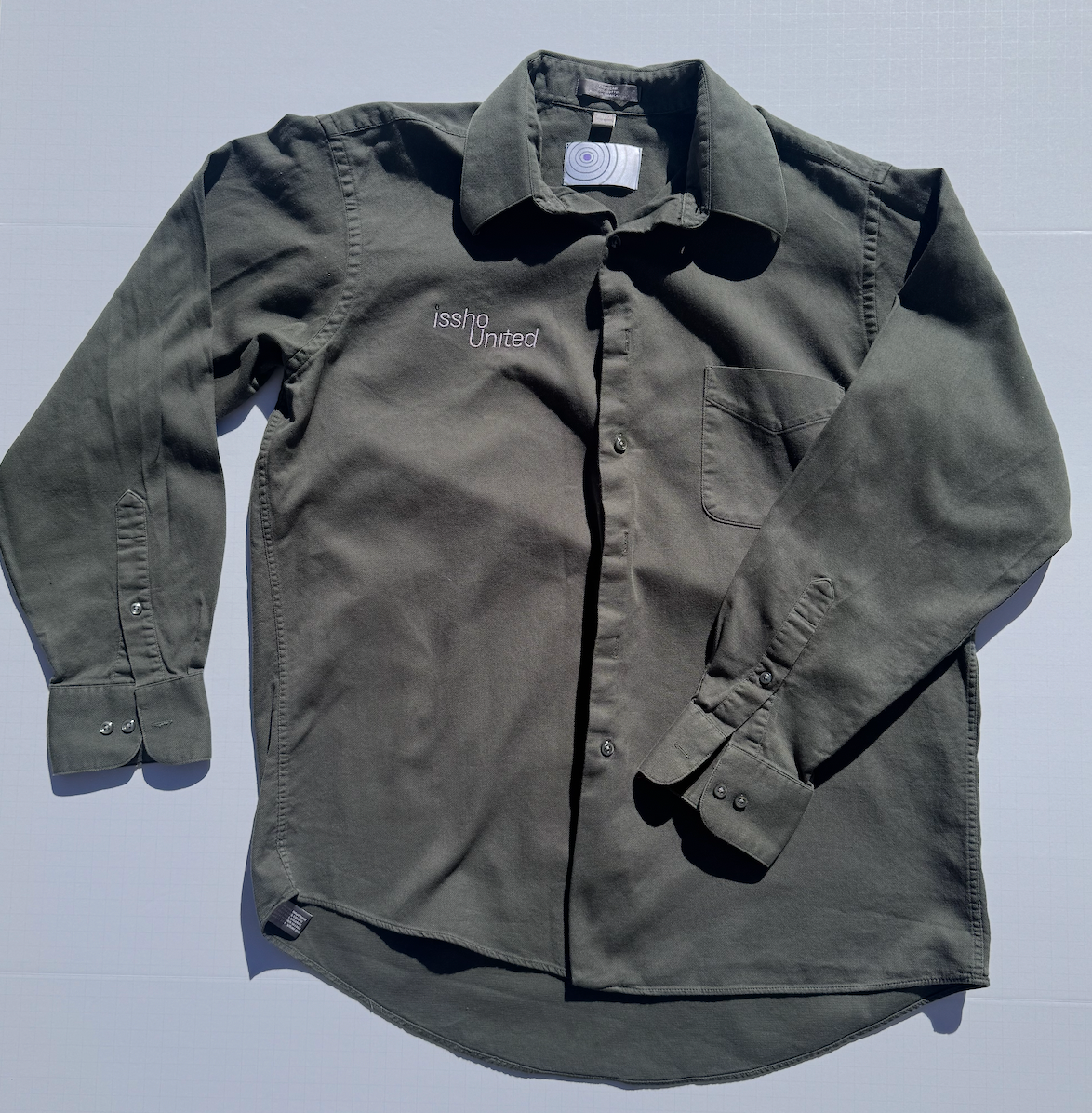 DARKGREEN: Upcycled 'issho United' logo shirts