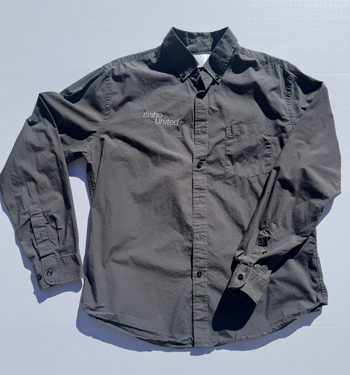 PLAINGREY: Upcycled 'issho United' logo shirts