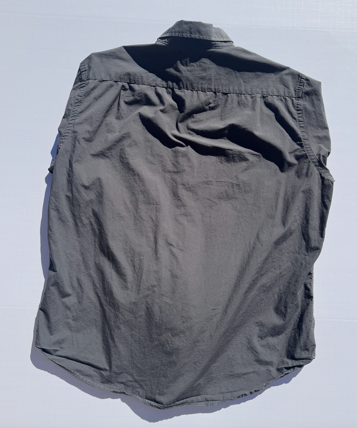 PLAINGREY: Upcycled 'issho United' logo shirts