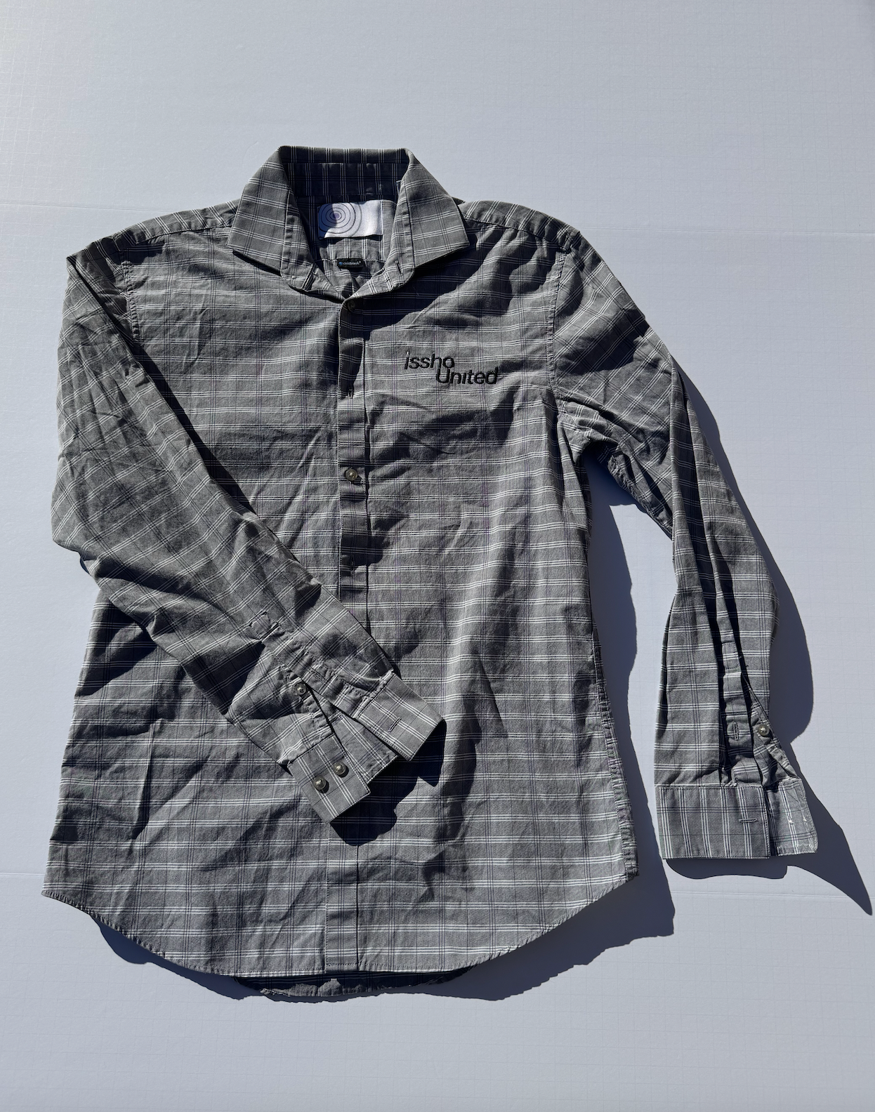 CHESS: Upcycled 'issho United' logo shirts