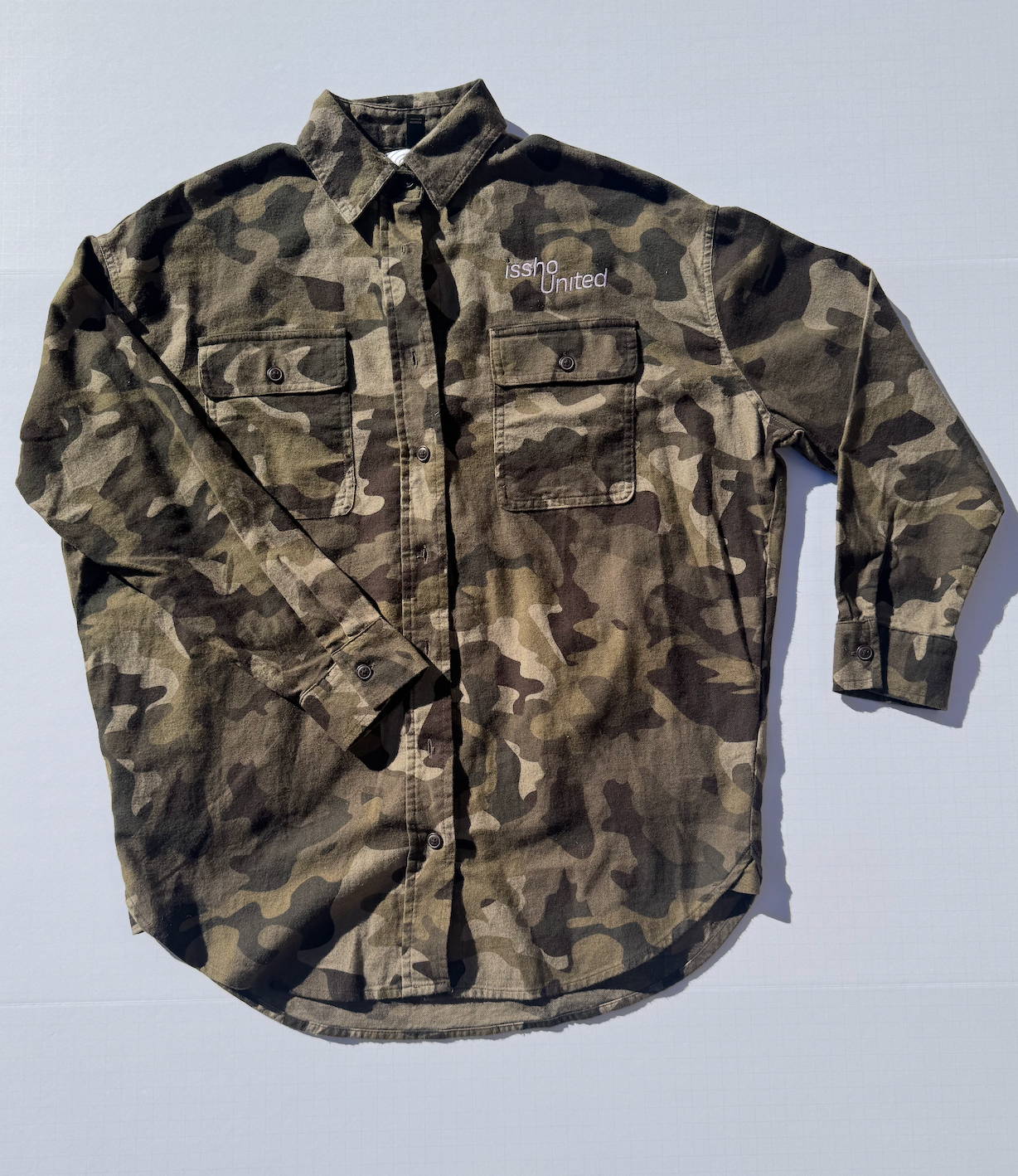 CAMO: Upcycled 'issho United' logo shirts