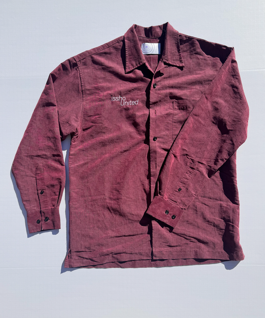 RED: Upcycled 'issho United' logo shirts