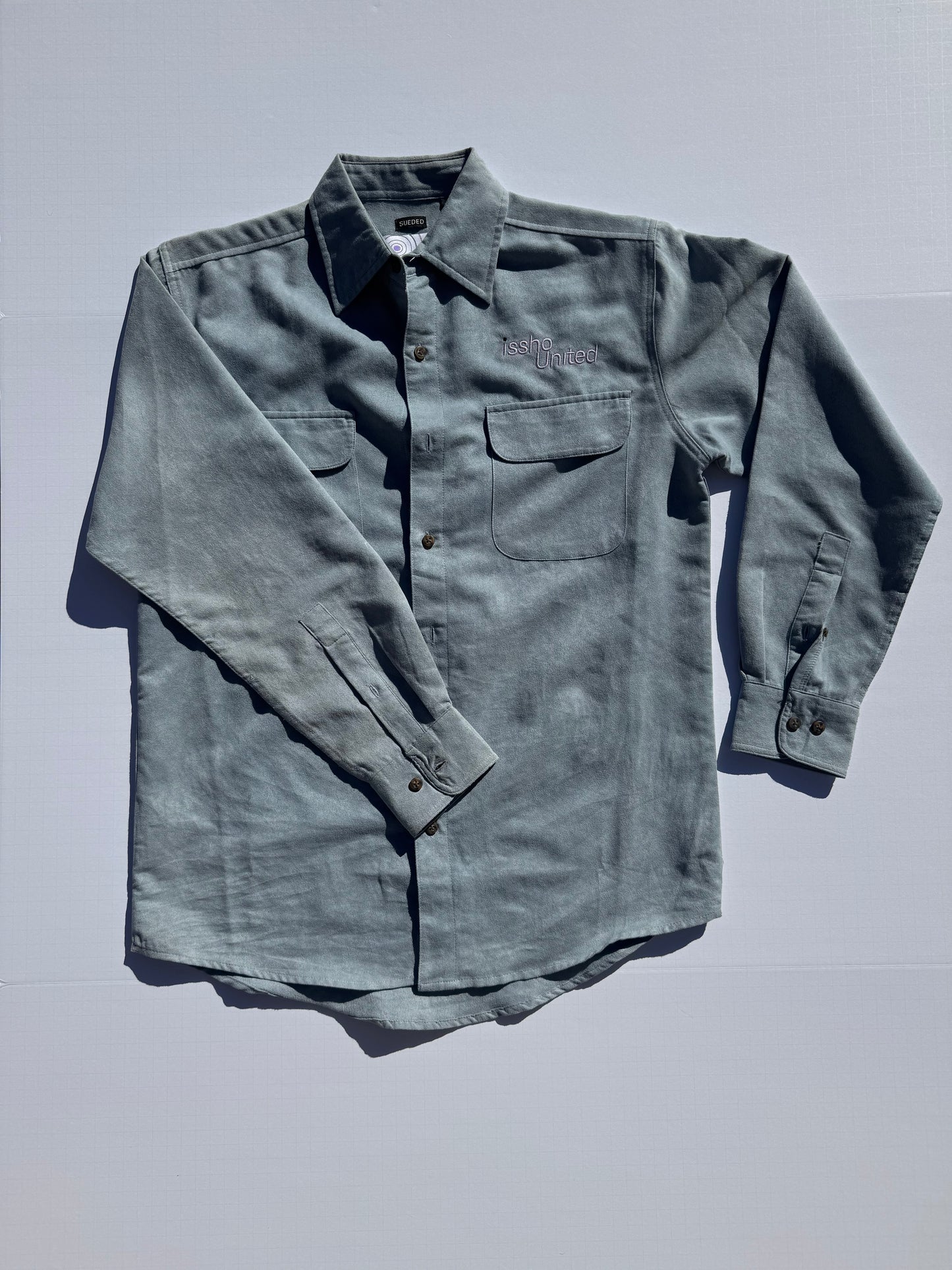 SUEDE: Upcycled 'issho United' logo shirts
